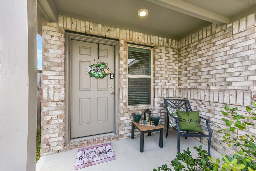 Exterior details and patio area of a home in Burnet Fields at Baytown Crossings, Baytown (Image 2).