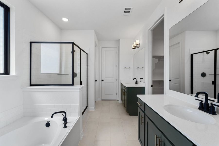 Primary bath. Note: Sample product photo. Actual exterior and interior selections may vary by homesite. Photo may be virtually staged