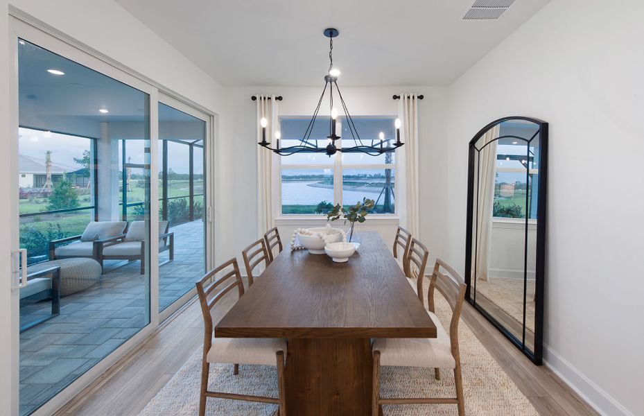 Representative furnished interior of a home built from the Mystique Grande by DiVosta in BeachWalk by Manasota Key, Englewood (Image 19).
