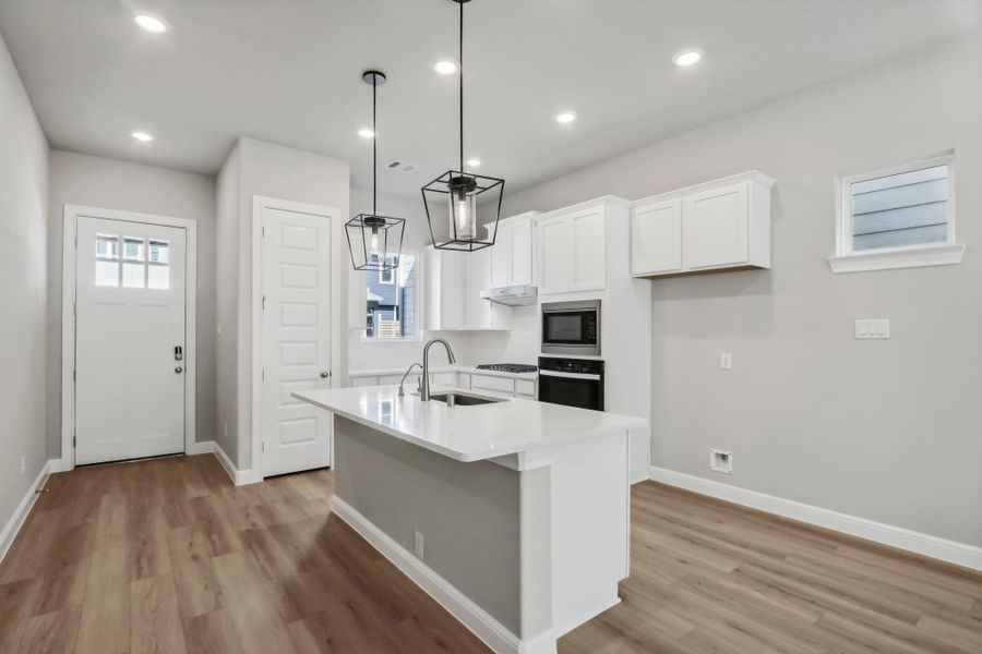 Photos are not of the actual home, but are photos of the builder home with same floorplan