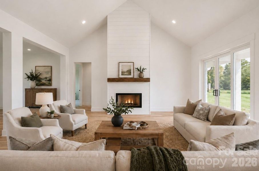 *representative photo- staged living room w/ vaulted ceiling
