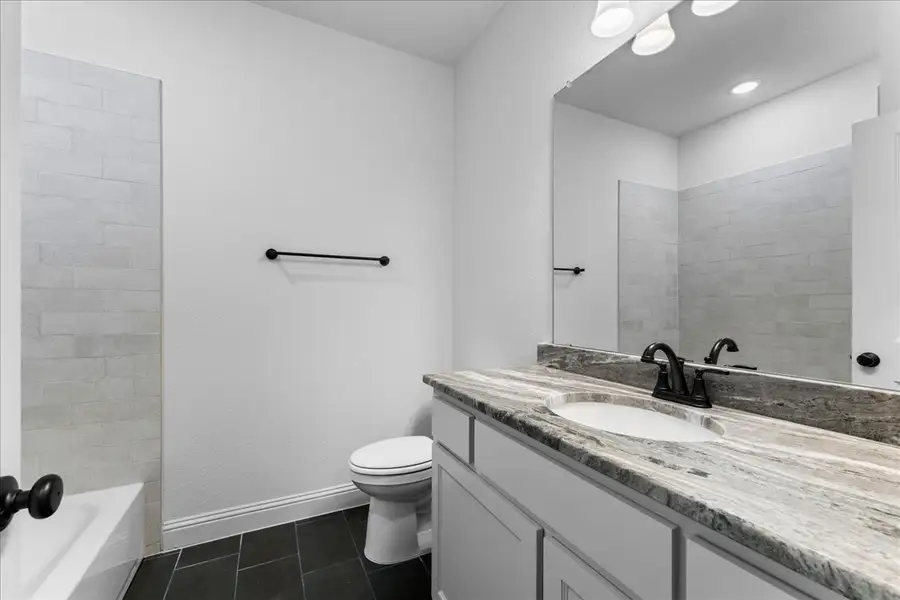 Representative furnished interior of a home built from the The Aylin by Doug Parr Custom Homes in Kessler Farms, Brock (Image 35).