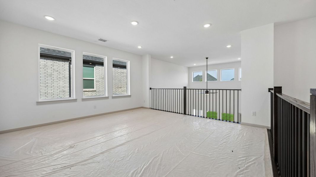 Representative unfurnished interior of a home built from the Orleans II by Normandy Homes in Rainwater Crossing, Celina (Image 15).