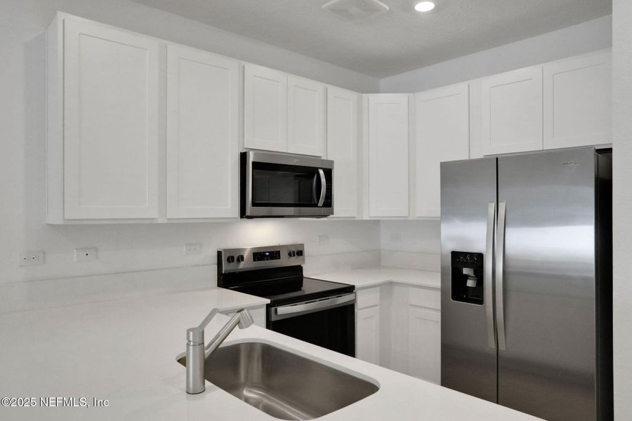 Furnished interior view inside a new home in , Jacksonville (Image 9).