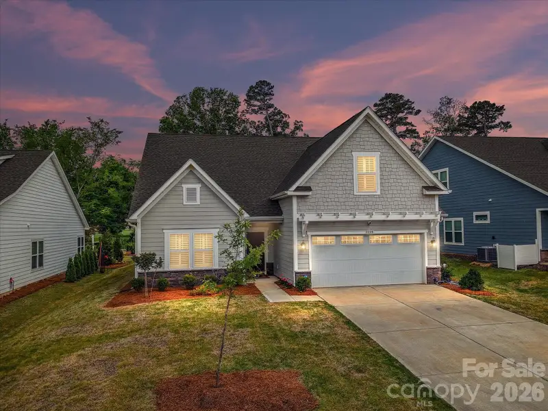 Front exterior of a new home in , Monroe, NC, highlighting curb appeal (Image 22).