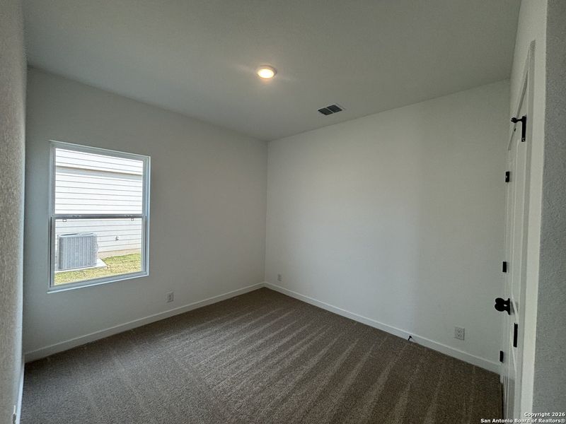Spacious, unfurnished interior of a new home in The Heights at Saddlebrook Ranch 60's, Schertz (Image 22).
