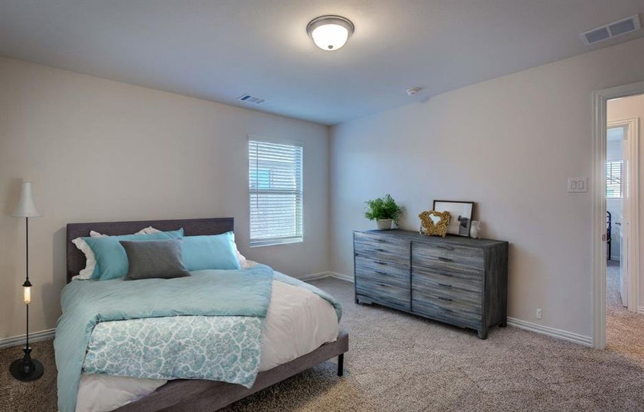 Bedroom featuring carpet floors