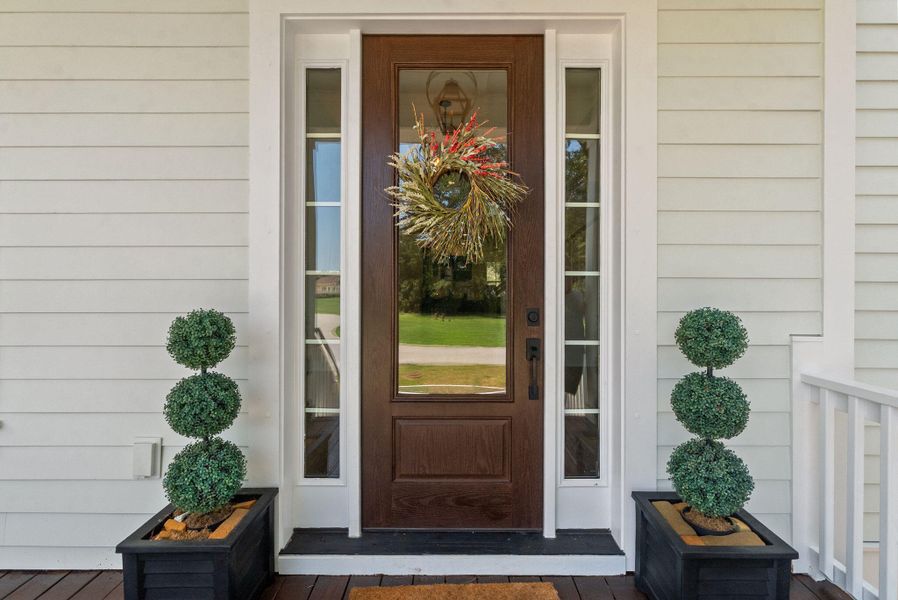 Exterior details and patio area of a home in , Johns Island (Image 3). Exterior details and patio area of a home in , Johns Island (Image 3).