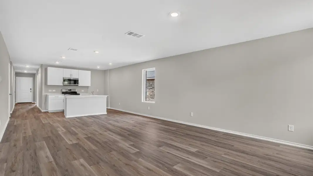 Spacious, unfurnished interior of a new home in Monarch at the Meadows, Ponder (Image 10).