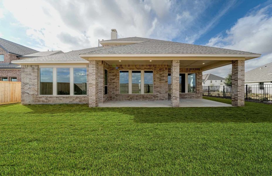 Exterior details and patio area of a home in Bridgeland 60′, Cypress (Image 3).