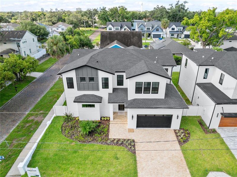 Front exterior of a new home in , Tampa, FL, highlighting curb appeal (Image 2). Front exterior of a new home in , Tampa, FL, highlighting curb appeal (Image 2).