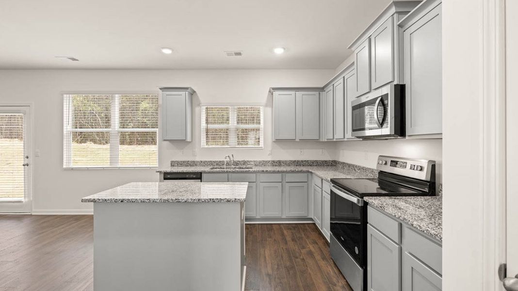 Representative furnished interior of a home built from the Packard by D.R. Horton in Evergreen Crossing, Locust Grove (Image 7).