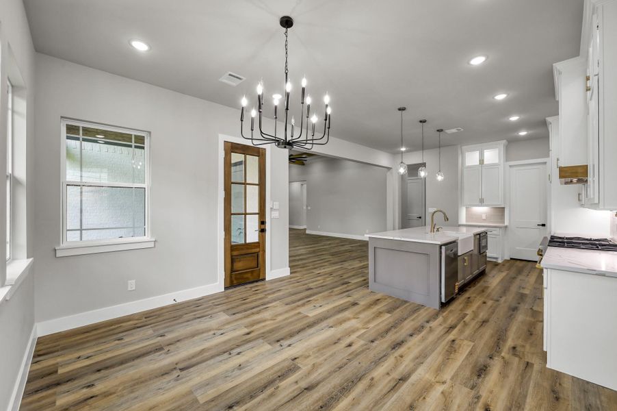 The dining room is framed by natural light and open sight-lines. The dining room is framed by natural light and open sight-lines.