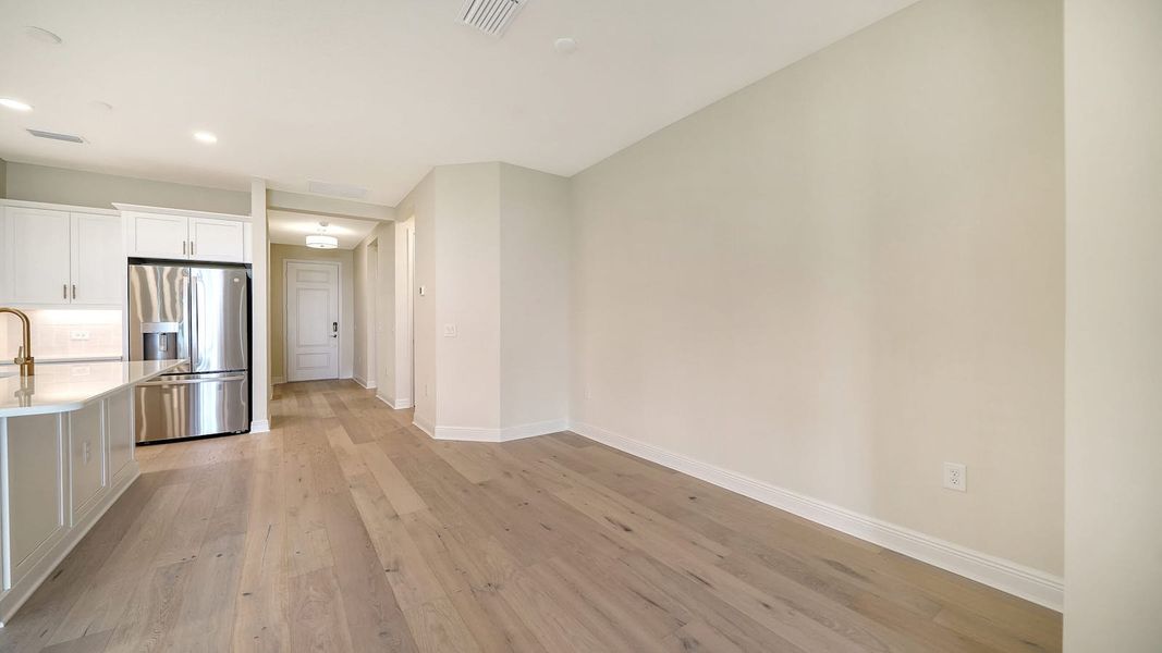 Spacious, unfurnished interior of a new home in Vistera of Venice Real Estate and Homes for Sale in Venice, FL - Neal Communities, Nokomis (Image 25).