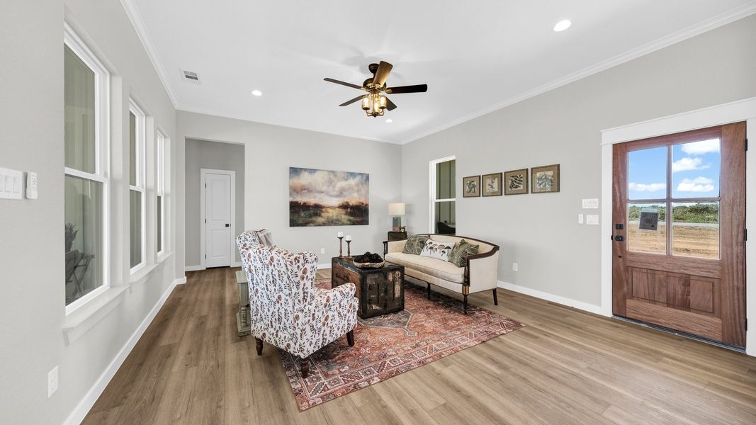 Representative furnished interior of a home built from the Loretta by Zeal Home Builders in Parallel Pastures, Poolville (Image 8).