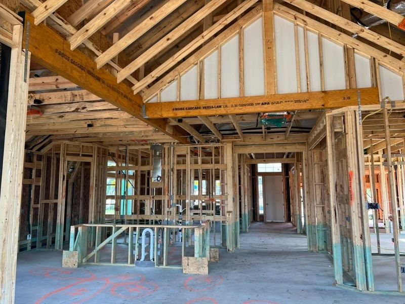 Miscellaneous room featuring vaulted ceiling