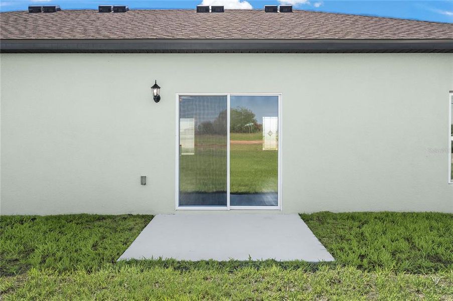 Exterior details and patio area of a home in Citrus Place, Babson Park (Image 3). Exterior details and patio area of a home in Citrus Place, Babson Park (Image 3).