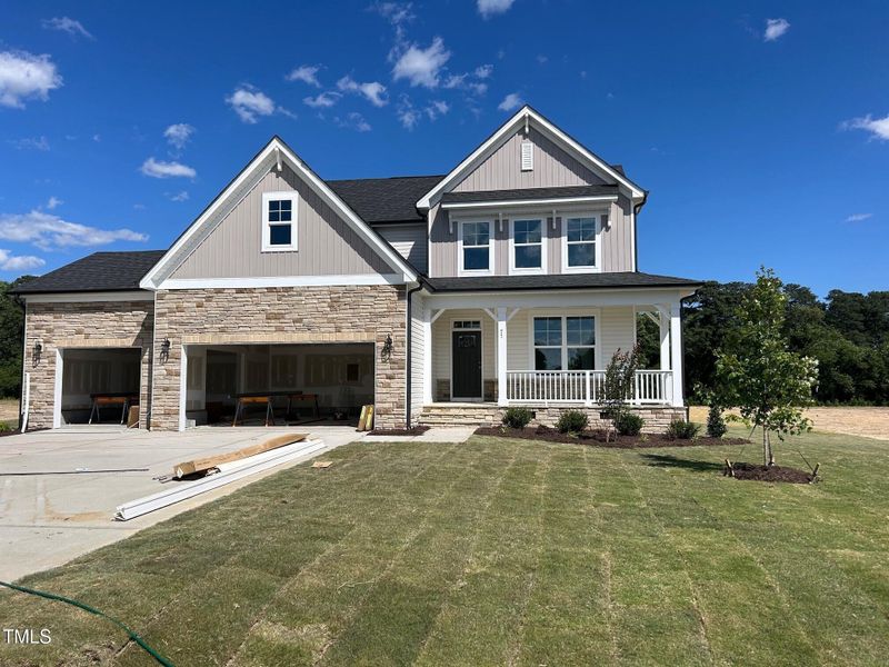 Front exterior of a new home in Tobacco Road, Angier, NC, highlighting curb appeal (Image 77). Front exterior of a new home in Tobacco Road, Angier, NC, highlighting curb appeal (Image 77).