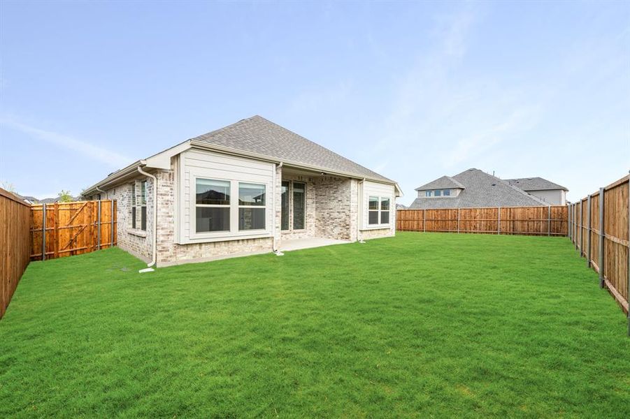 Exterior details and patio area of a home in ArrowBrooke Classic 50, Aubrey (Image 3).