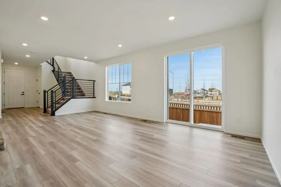 Spacious, unfurnished interior of a new home in Windler Wildflower, Aurora (Image 7). Spacious, unfurnished interior of a new home in Windler Wildflower, Aurora (Image 7).