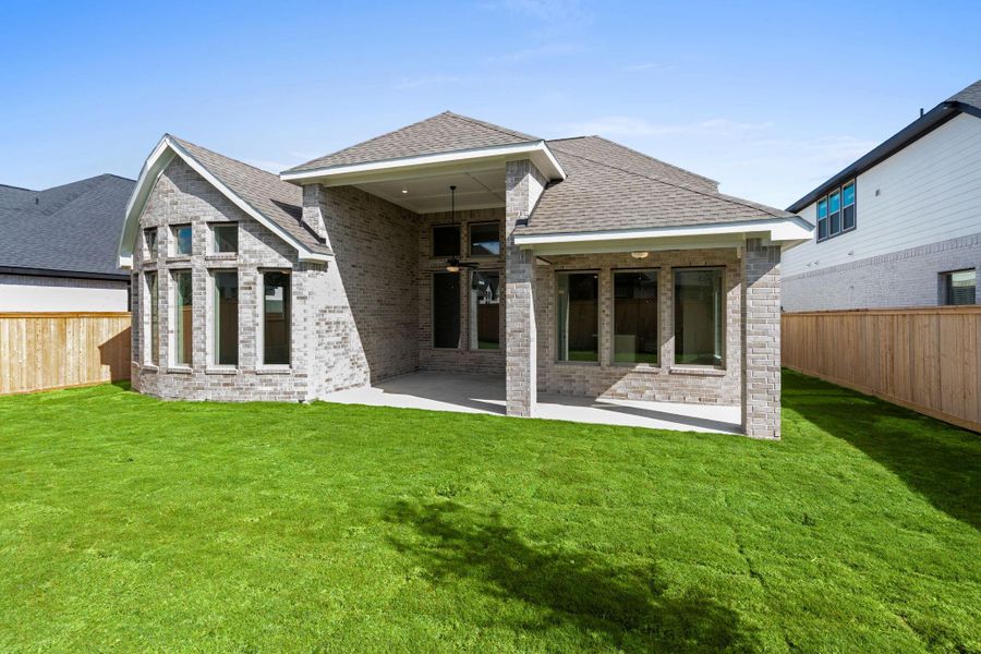 Exterior details and patio area of a home in Bridgeland 55', Cypress (Image 3).