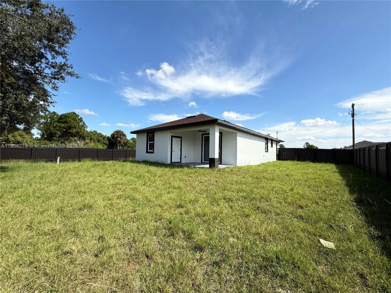 Exterior details and patio area of a home in , Lehigh Acres (Image 30). Exterior details and patio area of a home in , Lehigh Acres (Image 30).