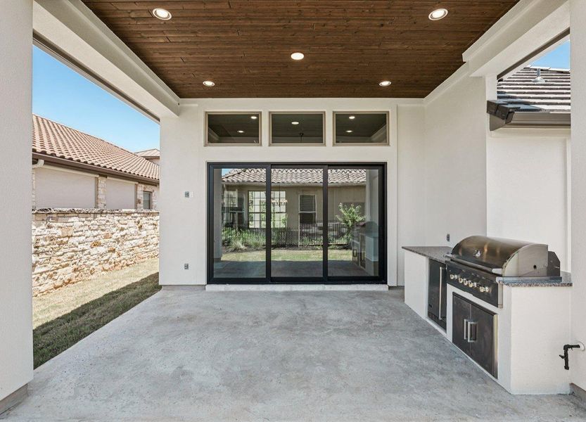 View of patio / terrace featuring exterior kitchen