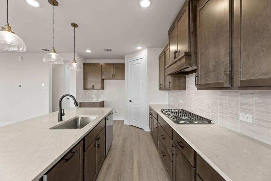 Furnished interior view inside a new home in Cottage Collection at Harvest, Argyle (Image 7).
