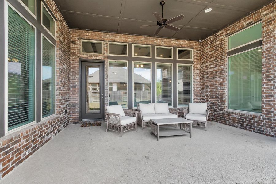 Exterior details and patio area of a home in Artavia 70′, Conroe (Image 22).