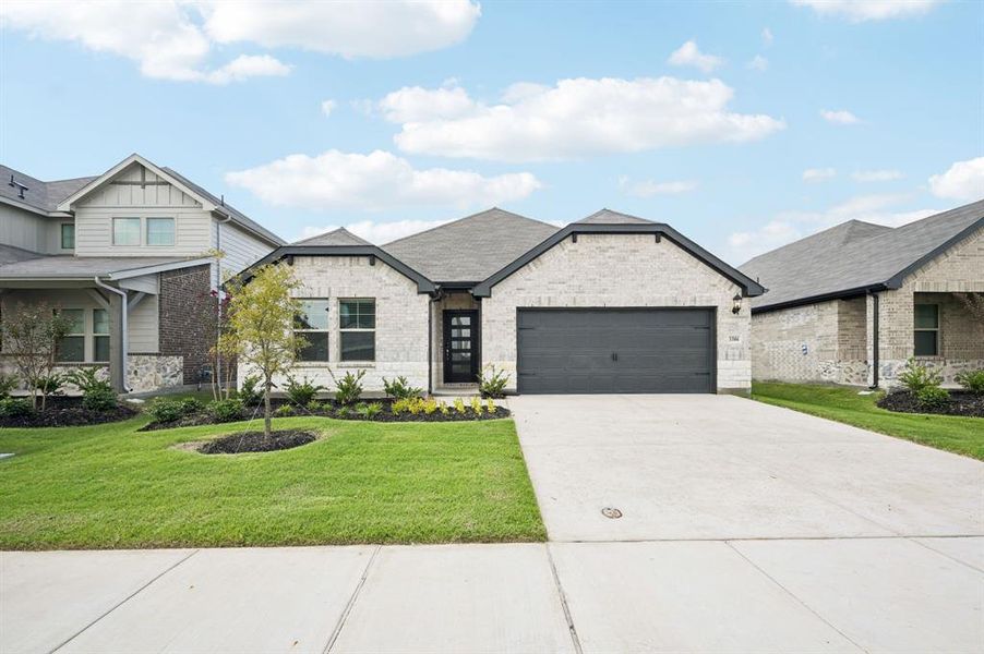 Front exterior of a new home in Lakehaven - Signature Series, Farmersville, TX, highlighting curb appeal (Image 19). Front exterior of a new home in Lakehaven - Signature Series, Farmersville, TX, highlighting curb appeal (Image 19).