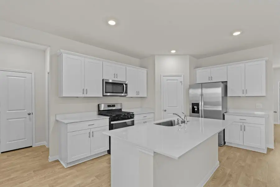 Furnished interior view inside a new home in Whisper South, San Marcos (Image 4).