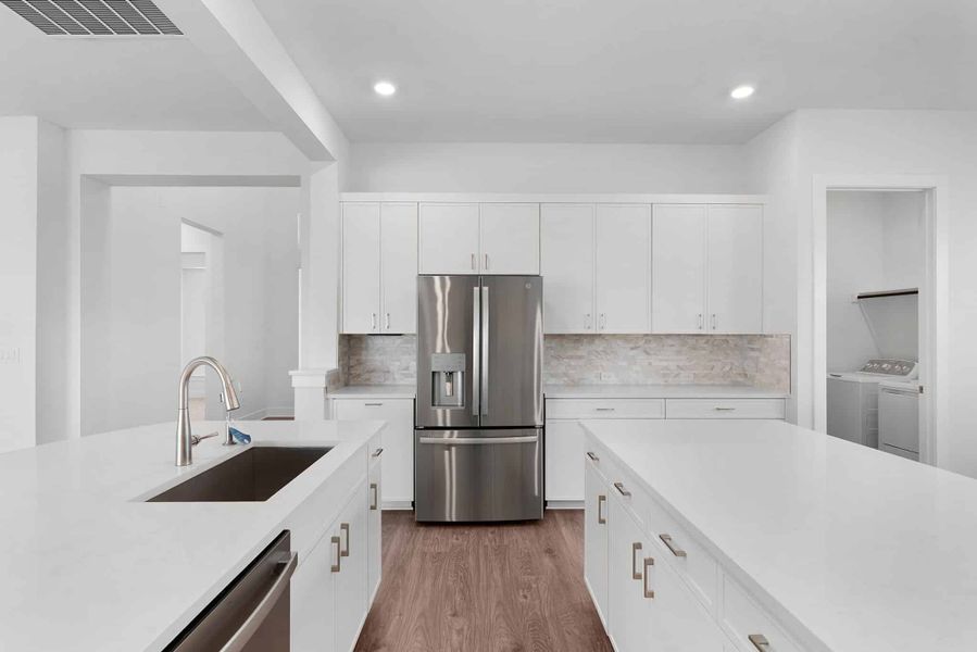 Furnished interior view inside a new home in Lariat, Liberty Hill (Image 8). Furnished interior view inside a new home in Lariat, Liberty Hill (Image 8).