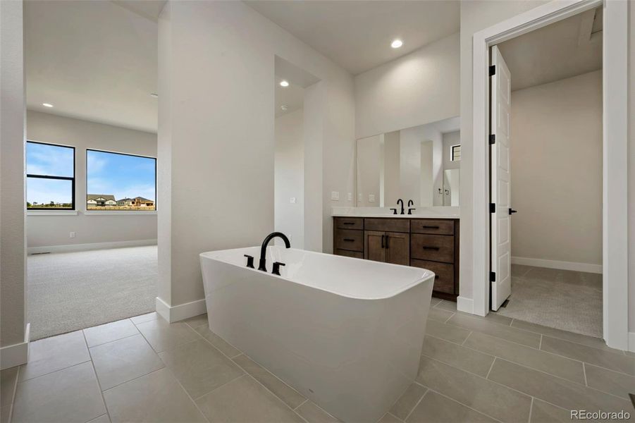 Furnished interior view inside a new home in The Fairways at RainDance, Windsor (Image 8).