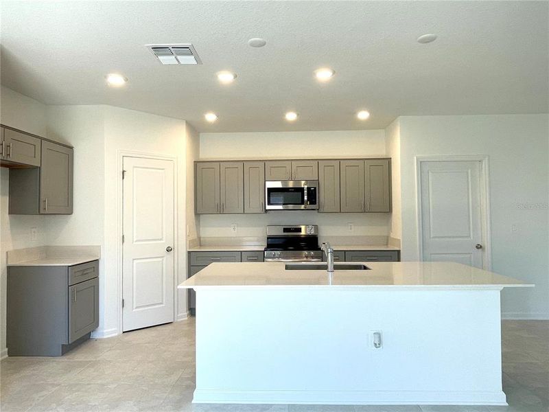 Furnished interior view inside a new home in Ranches at Lake Mcleod, Eagle Lake (Image 11).