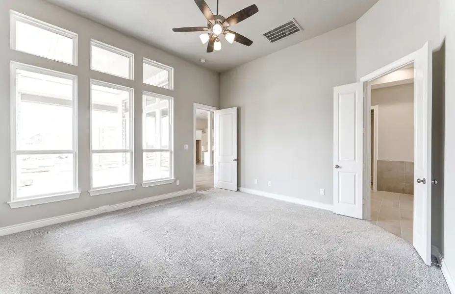 Representative unfurnished interior of a home built from the 2909 by Ravenna Homes in The Woodlands Hills 65′, Willis (Image 28). Representative unfurnished interior of a home built from the 2909 by Ravenna Homes in The Woodlands Hills 65′, Willis (Image 28).