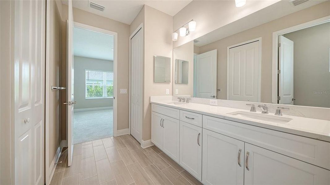 Furnished interior view inside a new home in Wildleaf at North River Ranch, Parrish (Image 11).