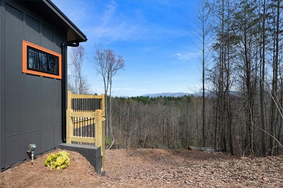 Exterior details and patio area of a home in , Ellijay (Image 22).