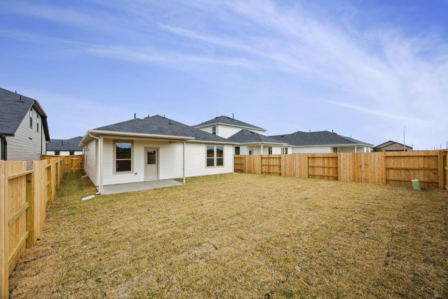 Exterior details and patio area of a home in Crosby Farms, Crosby (Image 3).