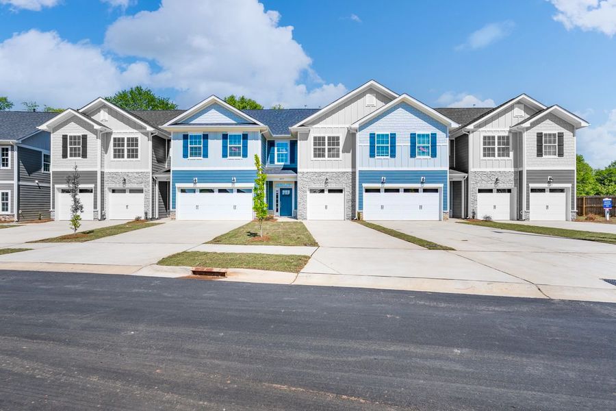 Front exterior of a new home in Pine Trace, Gastonia, NC, highlighting curb appeal (Image 1). Front exterior of a new home in Pine Trace, Gastonia, NC, highlighting curb appeal (Image 1).