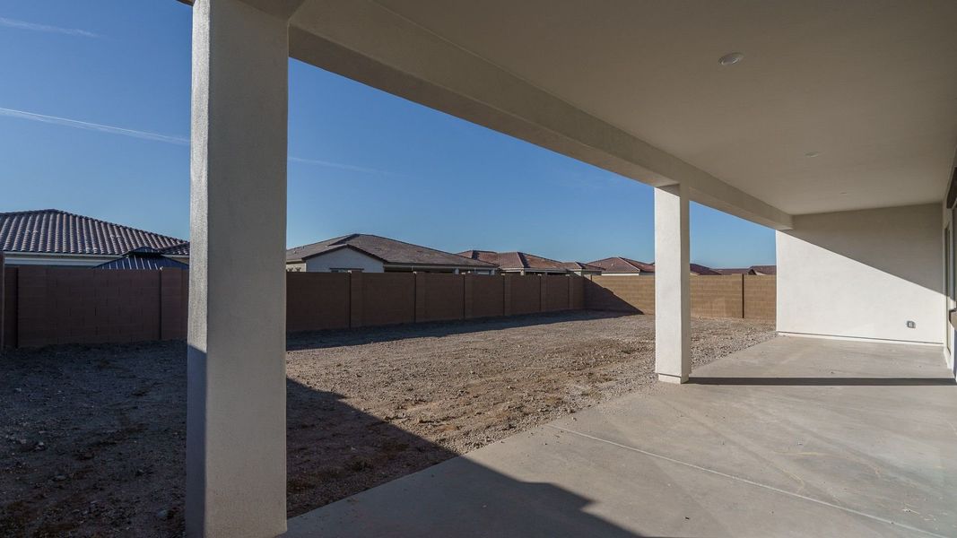 Exterior details and patio area of a home in Harmony at Montecito in Estrella, Goodyear (Image 5). Exterior details and patio area of a home in Harmony at Montecito in Estrella, Goodyear (Image 5).