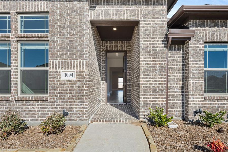 Exterior details and patio area of a home in Timberbrook, Justin (Image 26).