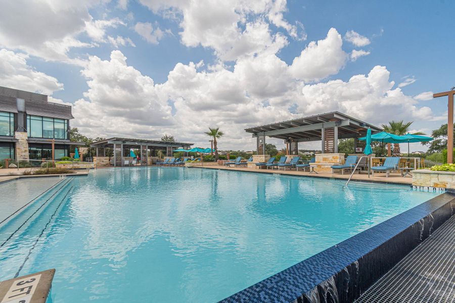 Community pool with a patio Community pool with a patio