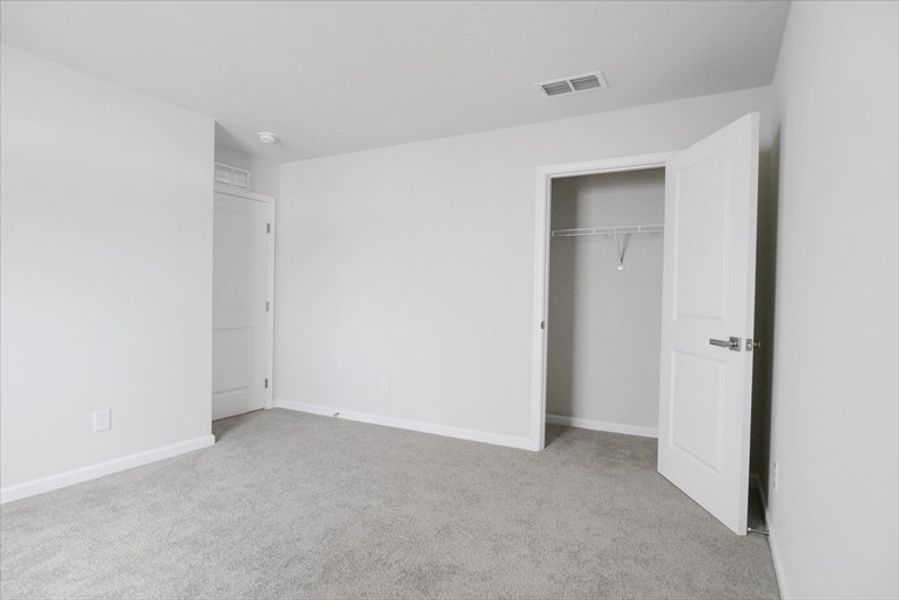 Spacious, unfurnished interior of a new home in Wren Woods 2-Story, Gray Court (Image 13).