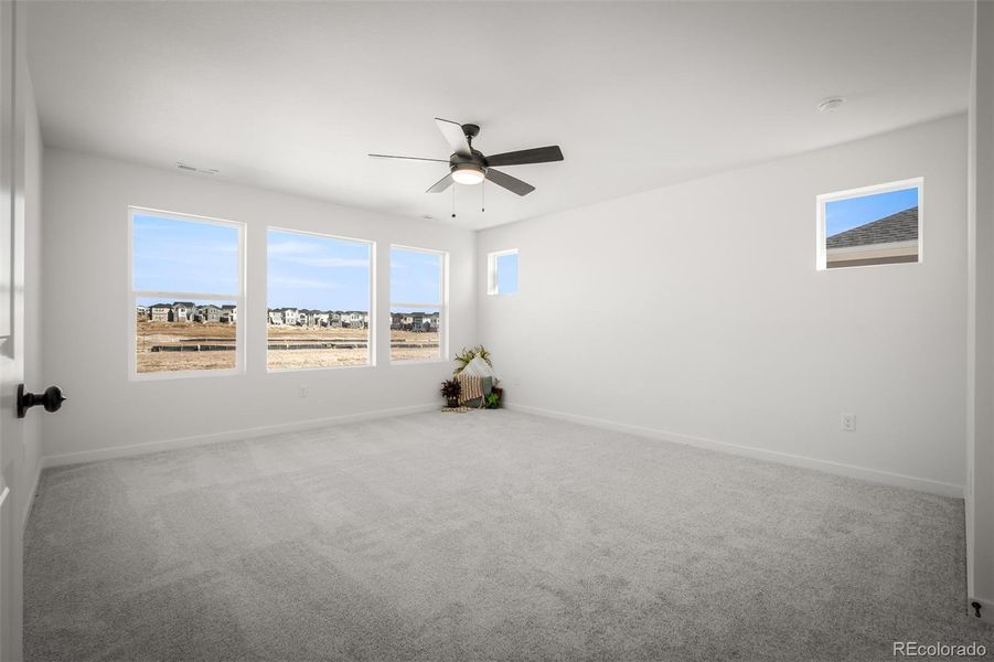 Spacious, unfurnished interior of a new home in Revel Crossing at Wolf Ranch – The Ascent Collection, Colorado Springs (Image 30).