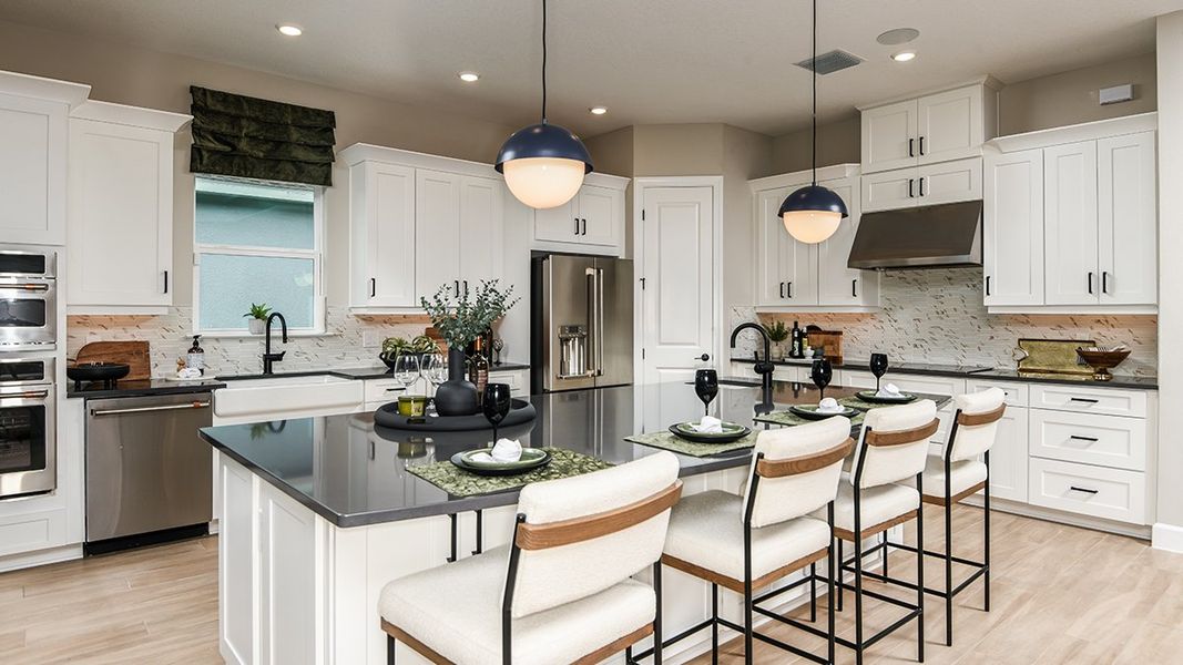 Representative furnished interior of a home built from the Pallazio by Taylor Morrison in Esplanade at Westview, Kissimmee (Image 12). Representative furnished interior of a home built from the Pallazio by Taylor Morrison in Esplanade at Westview, Kissimmee (Image 12).