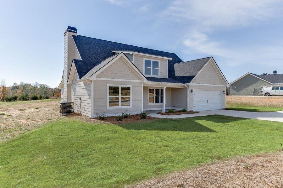 Front exterior of a new home in , Hartwell, GA, highlighting curb appeal (Image 19).