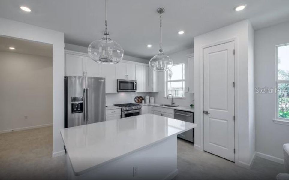 Furnished interior view inside a new home in Shores at Stillwater, Englewood (Image 8).
