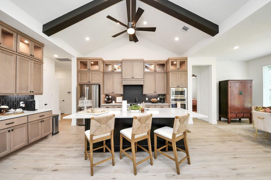 The island is striking adding a modern edge The island is striking adding a modern edge