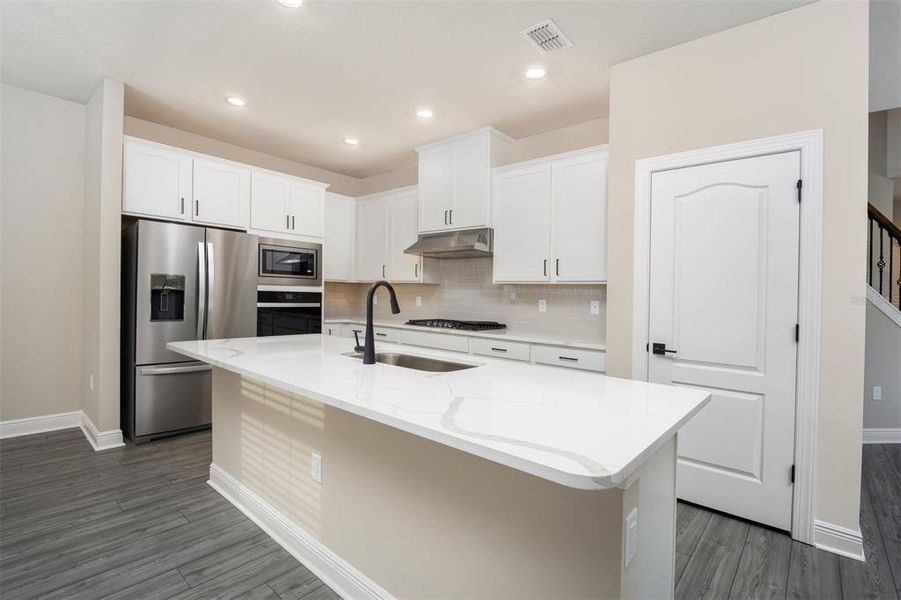 Furnished interior view inside a new home in Reunion Village, Kissimmee (Image 3). Furnished interior view inside a new home in Reunion Village, Kissimmee (Image 3).