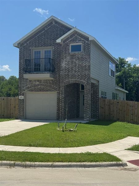 Front exterior of a new home in , Greenville, TX, highlighting curb appeal (Image 16). Front exterior of a new home in , Greenville, TX, highlighting curb appeal (Image 16).